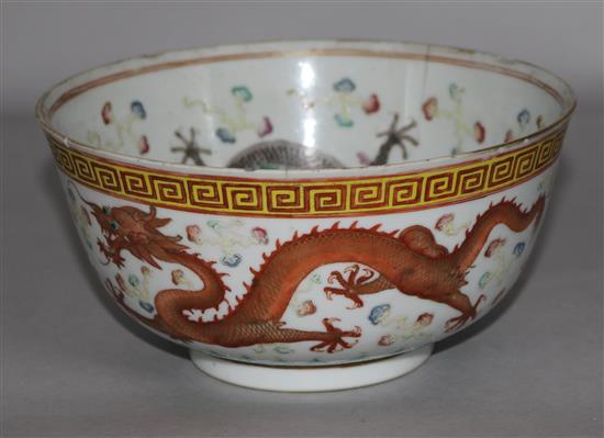 A Chinese enamelled porcelain dragon  bowl, Kangxi mark, early 20th Century, cracked